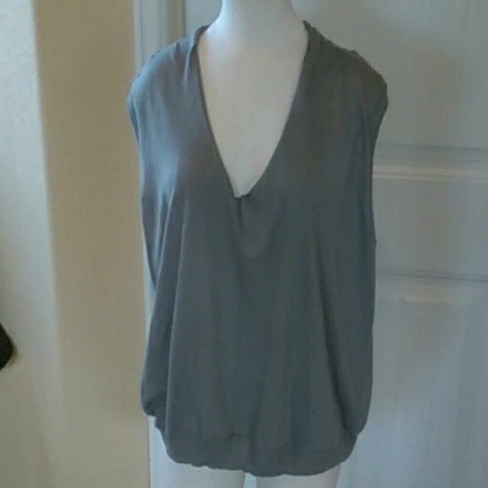 Sleeveless Low V neck blouse